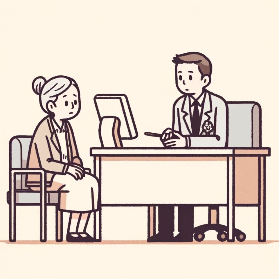 相談する高齢者